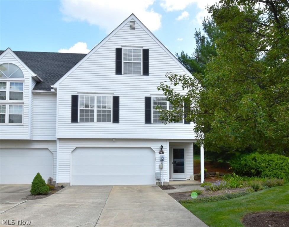 Wow!! This is the condo you've been waiting for!  Beautifully remodeled 3 bedroom 2 full bath condo in easy living Greentree development.  Enter the front door into the spacious foyer that opens to a family room suited for a workout room/game room/rec room that leads to laundry/utility area.  The main level boasts new vinyl flooring, all new paint, trim and a sliding door with between glass blinds. The new white cupboard kitchen with smooth white quartz is phenomenal and comes with all new appliances!  The white back-splash is illuminated by the under-cabinet lighting and a wine fridge with side storage is situated nicely under the new island as an extra perk.  One bedroom remains on the main floor with a fully renovated bathroom.  On the third floor you'll find two more bedrooms with all newly installed carpet and another remodeled full bath.  Enjoy nature as you relax out on the deck that overlooks a large wooded lot!  Make an appt today!