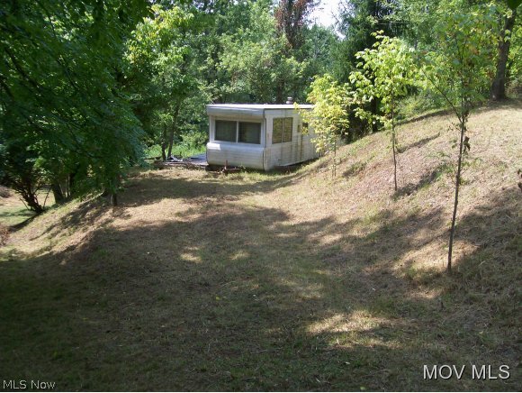 Nice river lot with septic, well,  electric and older trailer.  Elem: Wirt Cty. Primary Ctr. School  Elem/Bus: Y  JrHigh: Wirt County Middle School  JrHigh/Bus: Y  High: Wirt High School  High/Bus: Y  Fire: VOL  Police: SHF