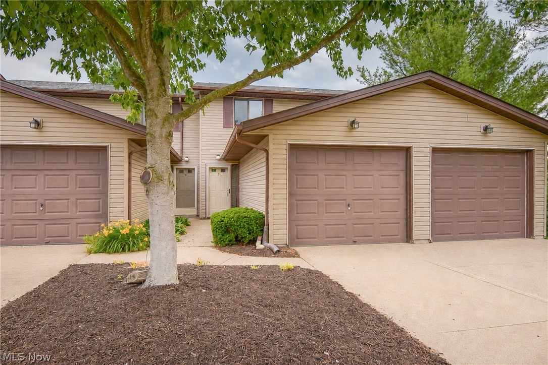 Welcome to this move-in-ready 2-bedroom, 1.5-bath townhouse located in the Breckenridge Commons community, offering easy highway access for a convenient commute! Step through the front door into the welcoming foyer, which provides access to the attached one-car garage, a convenient half bath, and a coat closet. From there, you'll enter the kitchen, which features LVP flooring, granite countertops, and all appliances included.  Beyond the kitchen, you'll find an open dining area and spacious living room, creating a comfortable flow for everyday living and entertaining. The living room offers direct access to the back patio, the perfect spot to relax and unwind. Enjoy the convenience of first-floor laundry with your own washer and dryer hookups.  Upstairs, you'll find two generously sized bedrooms, each offering excellent closet space. Completing the upper level is a full bathroom. Updated lighting, fresh paint throughout, LVP flooring in the entry and both bathrooms, newer granite bathroom vanities, and new six-panel interior doors add a clean, modern feel to the home. The attached garage provides extra storage space, and the HOA covers water, sewer, and trash. A new roof was installed in 2025. Don't miss your opportunity to own this well-maintained home.