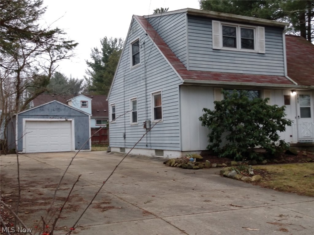 Former four bedroom Cape Cod located next to 100+ acre park like setting of Kent State University. This home features two full baths, fireplace, newer high efficiency furnace and hot water tank. Appears to  have had walkout basement waterproofed in the past. This home will need renovations to restore it to its original glory. What a great location, not a likely candidate for FHA financing. Come see!