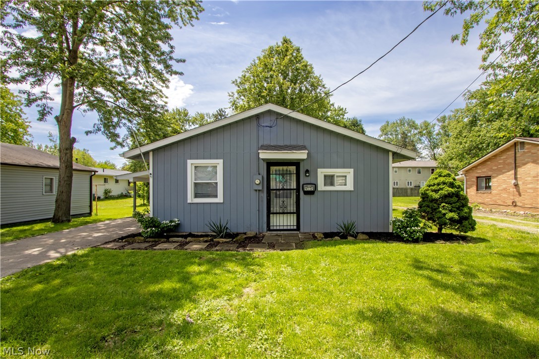 Charming and move-in ready, this adorable 2-bedroom home in Orrville offers comfortable all first-floor living! Featuring an updated kitchen and bathroom, this cozy home combines modern touches with easy everyday living. The low-maintenance yard makes upkeep simple, while the carport with concrete pad provides convenient covered parking. Laundry is located on the main floor, and all appliances will stay with the home.  This is a perfect opportunity for first time buyers, downsizers, or anyone looking for easy living in a great location!