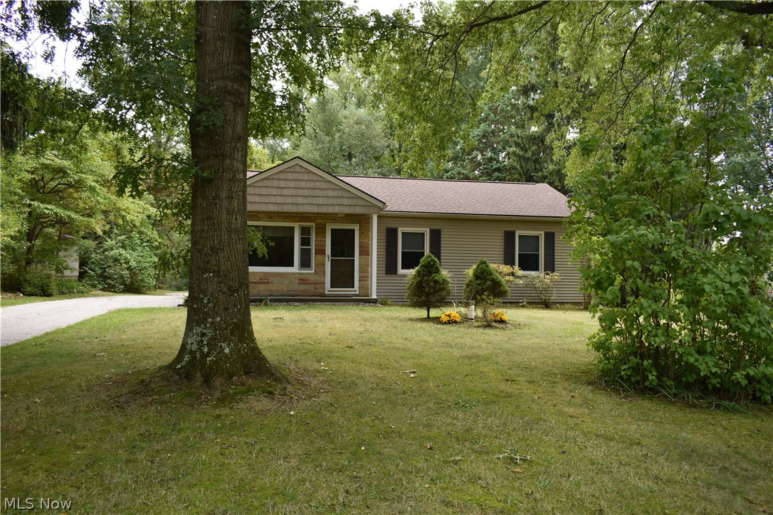 Don't miss out on this charming ranch on over an acre!  Three bedrooms and two baths with a large eat-in kitchen.  Sit on your front porch and enjoy a private peaceful view.  Shed with optional electric and 2 car garage.  Main bathroom floor replaced in 2020, new carpet throughout.  10 ton of gravel added to drive. Radon mitigation system just added and septic in process of being replaced.  New hot water tank in 2017. Full bath added to basement in 2013. New basement glass block and roof in 2012. New vinyl siding gutters, furnace, AC, water softener, upstairs bath remodeled new main electric panel in 2009.  New windows 2003.  New well, pump, and tank in 1999.