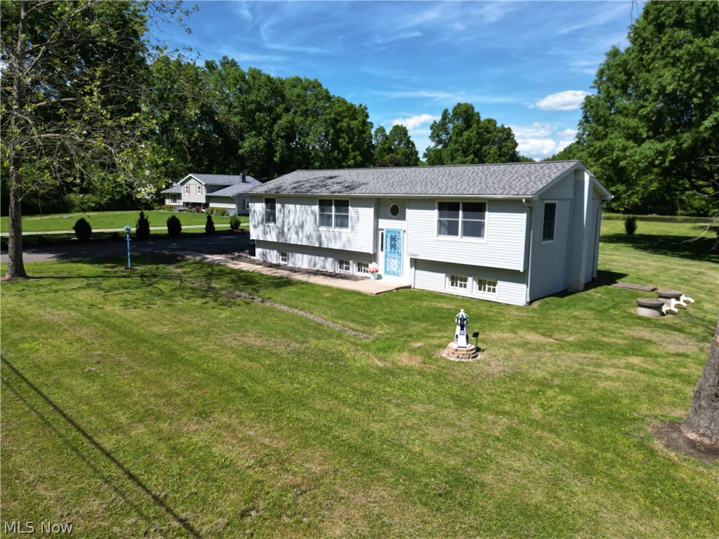 If you've been searching for space to live, work, and play, this property delivers it all!! Must see this well-maintained 4-bedroom, 2-bath bi-level home situated on over 1.6 acres. The property features an impressive 56' x 36' outbuilding, ideal for hobbies, equipment, vehicles, or a workshop, along with an additional storage shed for even more convenience. Enjoy peaceful views of your own private pond while taking advantage of the expansive outdoor space and extra-wide driveway that provides ample parking for guests, trailers, and recreational vehicles. Inside, you'll find a spacious layout designed for everyday living and entertaining. Major updates include a new roof and the added peace of mind of a whole-house generator. Whether you're looking for room to spread out, space for your toys and equipment, or simply a beautiful country setting to call home, this property offers endless possibilities. Don't miss this unique opportunity!