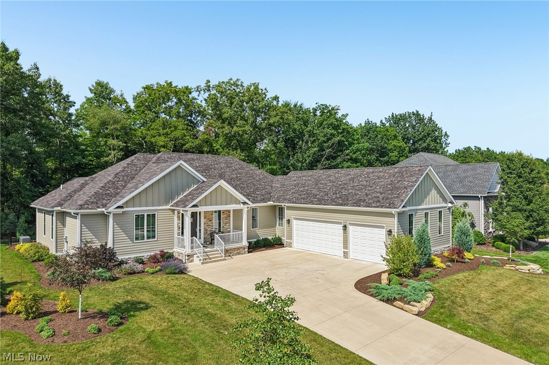 In the prestigious, sought-after Westford Development, this 4-bedroom, 2 full/2 half-bath ranch offers refined living surrounded by Kensington Golf Club and nestled in front of the 250-acre Kyle Woods Nature Preserve. New Home, Appliances, Landscaping & Fence.

This stunning residence showcases quality construction with high-end finishes, open floor plan, & high ceilings throughout. The exterior is beautifully appointed with Hardie Board, and stone skirting for timeless curb appeal.

The kitchen is a true chef’s dream, featuring a large center island with sink, quartz countertops, brand new appliances, coffee bar area, and an impressive walk-in pantry with custom wood shelving. The spacious dinette opens through sliding glass doors to a covered porch, perfect for enjoying peaceful wooded views and professionally designed backyard landscaping.

A desirable split-bedroom layout enhances privacy. The primary suite is thoughtfully tucked away, offering serene views featuring porcelain ceramic tile flooring, a walk-in zero-threshold shower, double sinks, and space for a stand-alone tub. A  walk- in Calfornia Closet closet provides exceptional storage and organization.

The great room impresses with soaring ceilings, a stone fireplace with custom beam mantle, and shiplap extending to the ceiling. Two additional bedrooms share a Jack-and-Jill full bathroom, each with a walk in closet, and a third bedroom can be used as dedicated  office 
Additional highlights include oversized Pella windows throughout for abundant natural light, a spacious laundry/mudroom, half bath, and a heated 3-car garage. The full professionally painted basement offers endless potential and a half bath bathroom.

Enjoy the Westford lifestyle with access to golf, shopping, & dining. Full sprinkler system in both front and back yards with separate water meter for irrigation. Home also offers a whole house generator, water softener,  reverse osmosis HALO -LED air purifier .