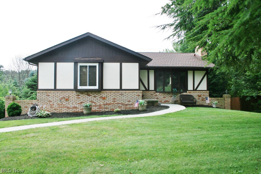 What a find in Green Local Schools! One owner for last 40 years, exceptionally clean & move in ready. Home boasts 3 bedrooms each with own walk in closet! Living room and kitchen with vaulted ceilings. 2 full baths, one on finished lower level with walk out basement adding 500+ square feet to living space. Basement walks out to screened in patio 15x12. Tons of closet space! New water softner, well tank, hot water tank, HVAC in last 3 years.  30 year shingles about 8 years ago. All big ticket items taken care of. Seller also willing to leave all appliances and most of the furniture! Seller offering one year home warranty! Call listing agent for details.