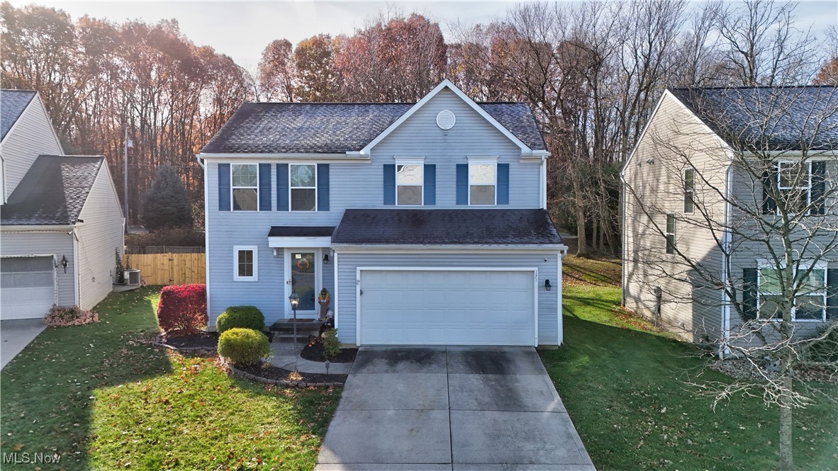 Welcome home to 171 Northwood Lane. This home is located in the heart of Tallmadge in the Eastwood Glen Subdivision. This modern colonial home features three bedrooms all on the second floor as well as two full baths and a half bath on the main floor. Upon entering the home you will enter into the oversized living area that opens to the eat in kitchen. The kitchen connects to the deck that also has a concrete pad outside. Downstairs you have plenty of storage space and also another finished living area with an added electric fireplace perfect for staying warm this holiday season. Call Brandon to schedule your private showing today !