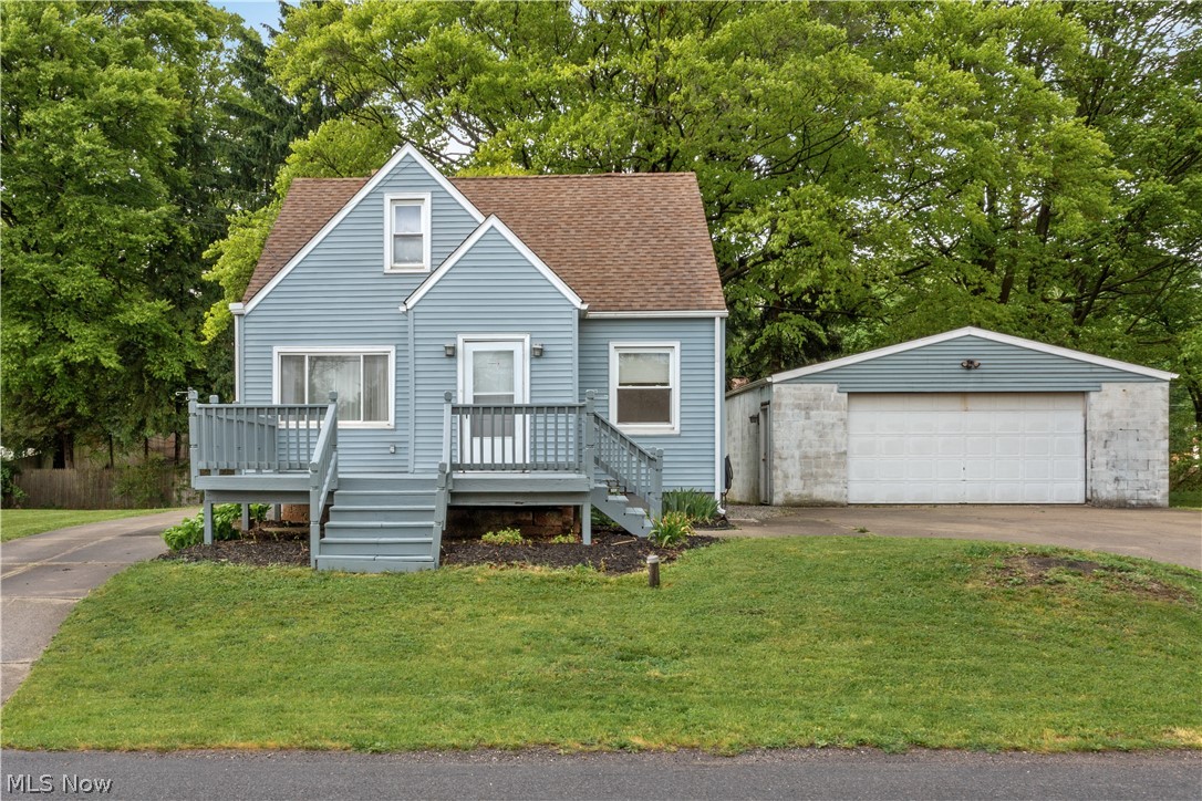 Welcome to 2787 Linwood Rd! This  home features hardwood floors throughout, a nicely updated kitchen and bathroom, 1st floor bedroom, oversized 2 car garage, triple lot, and a separate storage building with many possibilities. Two driveways also offer plenty of parking. You will want to see this one!