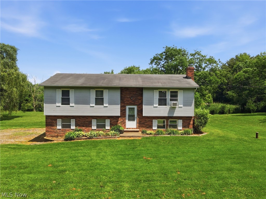 Welcome to 434 State Road in Geneva’s sought-after Harpersfield Township! Situated on 1.73 acres, this spacious 3-bedroom, 1.5-bath bi-level home offers the perfect blend of comfort, character, and country living while remaining conveniently close to local amenities.

Inside, you’ll find 1,688 square feet of living space featuring generous room sizes, abundant closet space, and a warm, inviting family room highlighted by beautiful beam ceilings and a stunning brick fireplace—the perfect spot to gather with family and friends. The functional layout provides flexibility for everyday living and entertaining alike.

Step outside through the sliding glass doors to enjoy the back deck, where you can relax and take in the peaceful surroundings of your private acreage. Additional features include a 2-car attached garage, private well and septic, and plenty of outdoor space for recreation, gardening, or simply enjoying nature.

If you’re looking for a home that offers space, charm, and a desirable Harpersfield Township location, 434 State Road is ready to welcome you home!