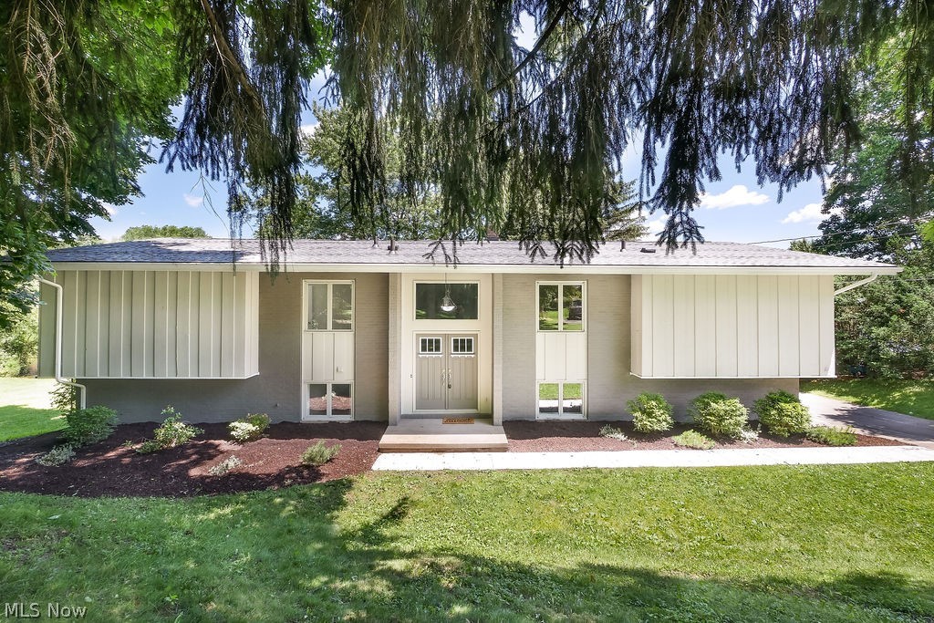 Completely renovated, water front property within minutes from Summit Mall and all Montrose has to offer. You will be amazed by the updates! The open concept kitchen offers lake views, new cabinets, granite counter tops, and brand new stainless steal appliances. The main floor offers 3 bedrooms including a beautiful master suite with walk in closet and renovated master bath. The main floor feautres lake views across the back of the home, gorgeous hardwood floors, updated lighting, and fresh paint throughout. The walk-out lower level offers a rec room and living space that would be perfect for entertaining or kids play area, along with a full bath. The exterior has a large deck over looking the lake, a large side yard, and shoreline for fishing and paddle boats. Other updates include a new dimensional shingle roof and high efficiency furnace. This home has so much to offer, schedule your showing today!