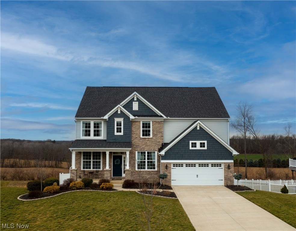 Nestled in the Sanctuary of Stone Creek, this home boasts attractive curb appeal and a desirable open layout ideal for entertaining. As soon as you walk in, you will admire the fantastic views, natural light, & spacious floor plan. Beautiful hardwood floors cover the entire 1st-floor. Located off the foyer is an elegant formal dining room (right) & a study/office (left). The 2-story great room is warmed by a floor-to-ceiling stone-surrounded gas fireplace, large windows w fabulous views & flows seamlessly into the eat-in kitchen. The chef's dream kitchen features contemporary cabinetry accented w a tile backsplash/Quartz countertops/a center island/stainless appliances(double oven)/a pantry/a lovely dinette area, & adjacent is a convenient 1/2 bath and a walk-out to the covered Timbertech deck. Upstairs are four bedrooms, including the master, each w a walk-in closet, a suitable 2nd-floor laundry room, and a 2nd bath. The spacious master suite offers a private bath w a massive walk-in