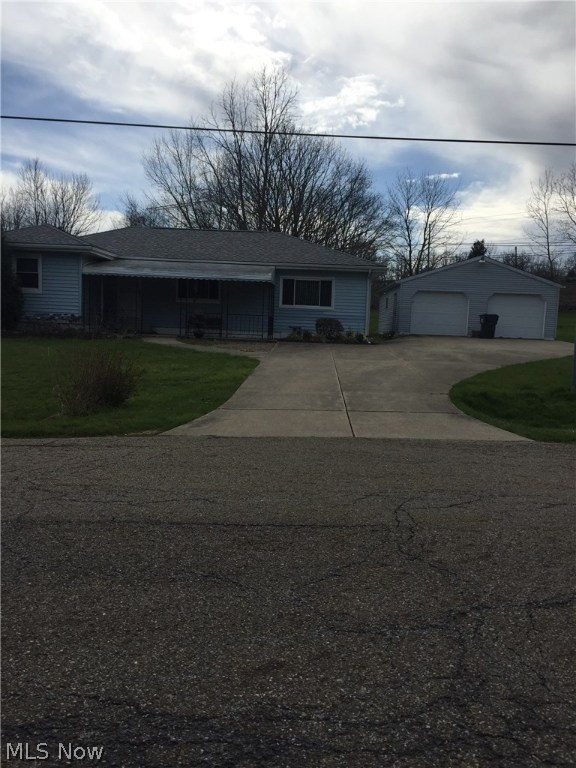 Charming ranch in a quiet setting in Green, Ohio.  Everything you need on one floor. 
Full basement with Rec Room and shower plus lots of storage space.
Large 2-1/2 - 3 car garage, paved drive and beautiful backyard view as you sit on the back porch.
Spacious dining room and updated kitchen. Spacious living room with access to back porch.
Convenient to stores, highway, parks, schools and more.
Just move in and make it your own.