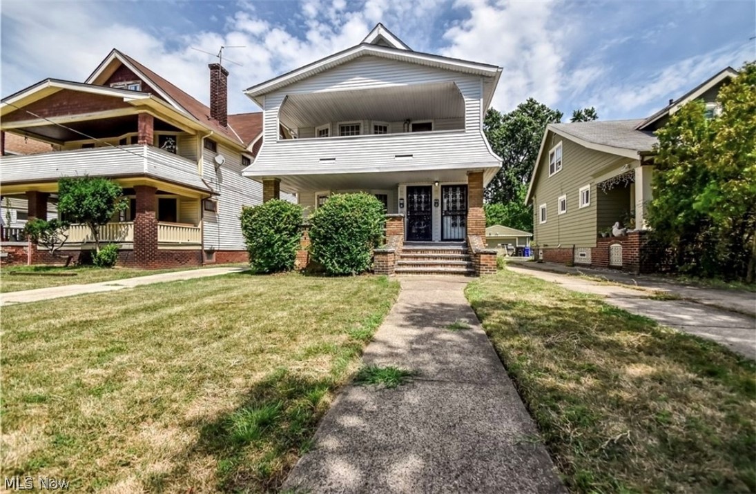 Become a Real Estate Investor Overnight! The hard part has already been done. Welcome to a turnkey triplex in the heart of South Collinwood offering immediate cash flow and strong long-term investment potential. Whether you're an experienced investor looking to expand your portfolio or a first time buyer seeking a performing asset, this property is ready to generate income from day one. The first and second floor units feature spacious floor plans with large living rooms, traditional dining rooms, oversized picture windows, two bedrooms, full kitchens, updated bathrooms, and large porches for your outdoor entertainment. The third floor offers a newly finished loft style unit with over 600 sq/ft of living space, soaring ceilings, and excellent rental potential.
Significant renovations were completed in 2019 and 2026 including a full tear-off roof, new windows, updated kitchens and bathrooms, new hot water tanks, updated siding, two newer furnaces, waterproofed basement, new stack, updated electrical panels, and a rebuilt front porch. The first and second floor units are currently occupied, providing immediate rental income, while the major systems and capital improvements have already been addressed, making this a true turn key investment. With strong cash flow potential, low maintenance concerns, and room for continued appreciation, this property is an excellent opportunity to build or strengthen your real estate portfolio. Home Warranty Included.