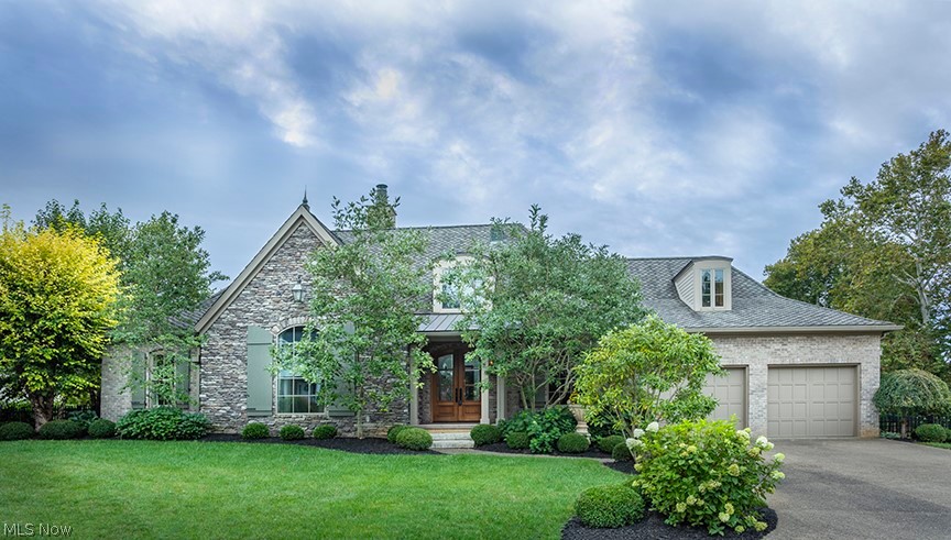 Beautifully crafted, this John Tee designed residence in HENDERSON WOODS features a modern approach to European architecture. Exceptional detail and thoughtful attention is evident throughout this like new condition home. Poured plaster mouldings and mullion glassed entry doors enhance the grand entry hall with volume 
height. There are 10 foot ceilings through out the main level. Pretty white custom cabinetry, granite countertops, butlers pantry, dining bay and adjoining keeping room with Clerestory windows, fireplace and 8 foot french doors compliment the gourmet kitchen. Perfectly designed for easy entertaining. The master retreat has access to covered porch with garden views and stunning bath with soaking tub and free standing shower. Two additional guest rooms. All floors are solid hardwood or carrara marble. Unfinished lower level offers the potential for additional living space. Blueprints are on site. Maintenance free exterior features stacked stone, hardi plank and life time