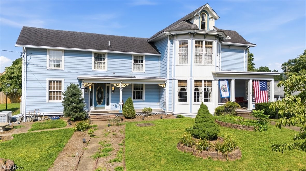 Step into a piece of history with this remarkable 1879 Williamstown, WV, home, where timeless craftsmanship and architectural character blend beautifully with spacious everyday living.  Offering nearly 3,000 square feet, this distinguished residence features four generously sized bedrooms and three full bathrooms, providing plenty of room for family and guests.  

From the moment you enter through the solid wood front double doors (with its own skeleton key) you'll appreciate the exceptional details that define this historic home.  Elegant coffered ceilings in the second front entry and office/den, impressive woodwork, tall ceilings, seven decorative fireplaces and the craftsmanship so characteristic of the late 19th century create an atmosphere of warmth and sophistication.  Spacious formal living room with a wall of windows and formal separate dining room are perfect for entertaining.  The kitchen offers an island, bar seating and an eating area with double doors to access the back patio.

Situated on a beautifully landscaped 0.35 acre lot with abundant road frontage, the property has exceptional curb appeal.  A detached two-car garage offers convenient parking and additional second level storage.  Located very near the Ohio river, you'll enjoy the beauty, history and charm of one of the area's most desirable locations with easy access to amenities, riverfront parks and dining.

If you've been searching for a home rich in history, this extraordinary residence is a rear opportunity to own a true landmark.