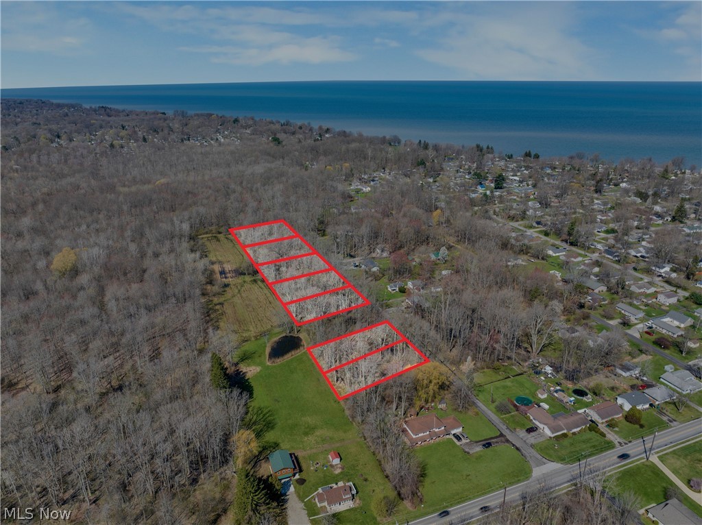 Great opportunity for a residential build! Three wooded lots (.1561 acres each) or .47 acre total, on beautiful
Magnolia Drive in Madison Township. Individual lots are 40'x170'. Paved road with existing houses on north side of the
street. $25,000 includes timber value. City water and sewer at the end of the street on Hubbard Road. Current homes
have septic and well. Lots are on existing paved street. 1/2 mile from Lake Erie, Madison Township Park, restaurants and
Vincent William Winery. Lots are three separate parcels, .47 acres each. Seller will combine parcels into one larger lot at
closing. Buyer is responsible for any building permits or approvals.