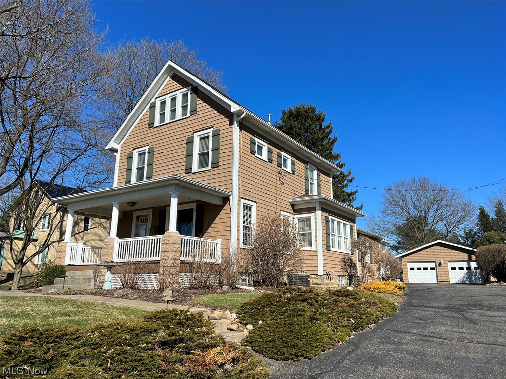 Enjoy scenic views of Tuscora Park!  Move in ready, 4 bedroom home overlooking the Park!  Inviting, covered front porch with vinyl deck railing.  Neutral decor throughout with gas fireplace in the living room.  Custom oak kitchen with solid surface counters, ceramic tile backsplash and stainless steel appliances that opens to the family room with hardwood floors and 2 sets of French doors to the vinyl covered rear deck.  Remodeled 2nd floor with spacious master bedroom, walk in closet and full updated bath.  Finished walk up attic includes 2 additional bedrooms.  Potential rec room in the lower level.  Anderson and Polaris thermo replacement windows throughout.  200 amp electric.  Oversized, 31' deep, detached garage.  Large, 302' deep level lot.  The taxes reflect the seller receiving a homestead credit of $338.10 annually.