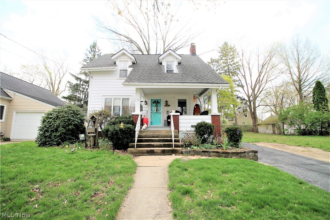 Welcome to this updated three bedroom, two full bath colonial home which radiates with pride and love. Come inside from the fabulous front porch and the new front door.  The first floor flows seamlessly with the family room which has a wood burning fireplace and is open to the dining room which has abundance of windows to let the natural light shine through. The kitchen features granite counters with luxury vinyl, lots of cabinets, stainless steel appliances and small area which could use a small table, etc with new sliding doors to the backyard on to the new deck and Flagstone patio and fenced in backyard with fire pit for all the finest of outdoor living!  The first floor has full bathroom which was added in 2016 with modern finishes and tile shower. Upstairs their are built in cabinets in the hallway for more storage and three bedrooms and a gorgeous full bath with granite and double sinks which completes the second level. The waterproofed basement is partially finished with an indu