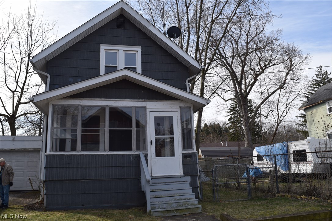 Why Rent? Affordable 2 bedroom, 2 bath home on a dead end street. 1 Car detached garage, fenced back yard and enclosed front porch. French drain added in back yard in 2007. Furnace in 2017. Roof in 2009. Garage roof in 2000. HWT in 2019. TV & stand will convey.