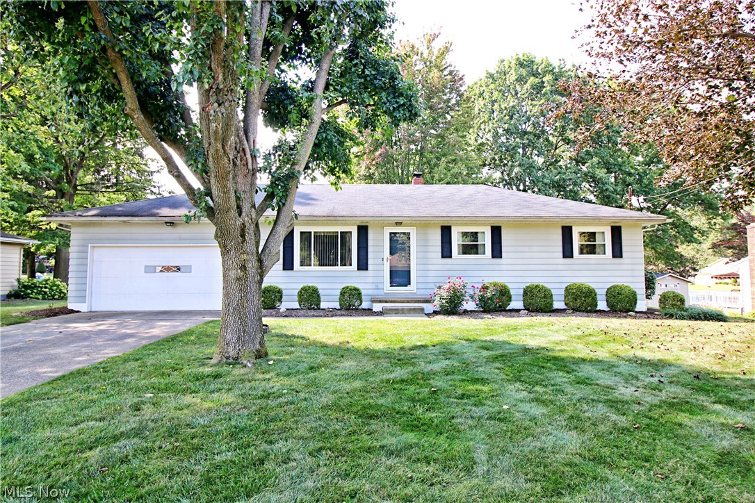 One floor living in this 3 bedroom, 2 full bath Norton Ranch. Lovingly cared for throughout! Living room open to dining room/kitchen.  Spacious kitchen with beautiful cabinetry, all appliances and L-shaped peninsula.  Three Season Sunroom steps out to patio.  Master bedroom with full adjoining bath.  Partially finished basement with office. Convenient attached 2 car garage.  Newer roof and A/C. Home warranty included!