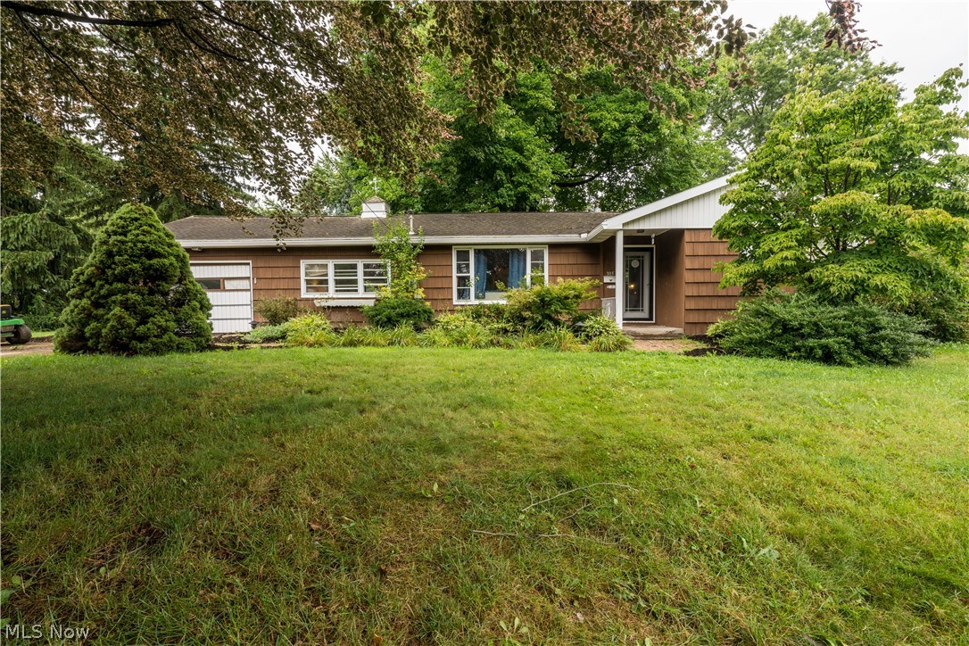 This cozy ranch in Perry features 2 bedrooms and 2 full baths on just over a half-acre lot.  The kitchen appliances as well as the washer and dryer convey with the home. There is a covered porch measuring 28x10 and a brick patio in the rear.  A spacious breezeway connects the home to the one car garage. The basement has a finished full bath. Also in the lower level is a space that was started to be renovated as a 3rd bedroom, and could easily be finished. A shed in the back is ideal for extra storage. Book your showing today!