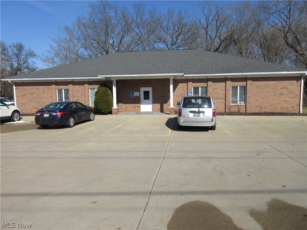 Well maintained, 4,000 square foot all brick building. Reception area, 2 offices, lounge area, large open room, and restrooms. All on one floor, very accessible. Triple net lease. Excellent location, close to Kent State Tuscarawas with easy access to State Route 250. Many possibilities.  For sale or lease.   Also available for lease.  See mls#4072689 .