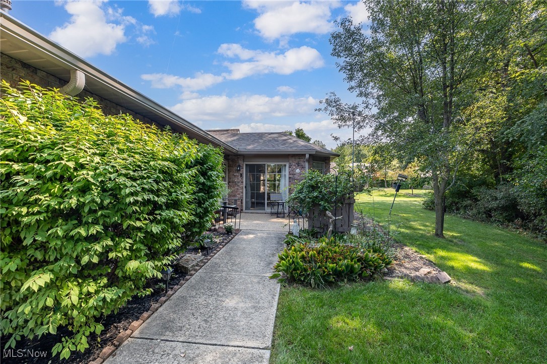 Welcome to this private condo in the private, wooded community that is Devonshire Meadows in the heart of Avon. This condo is one level that includes two bedrooms and two full bathrooms. The owner's suite features a huge walk-in closet. The eat in kitchen and main living area are open concept. Additionally, there is a den with a gas fireplace. There is a RARE sunroom that faces a completely private, wooded view and has a sliding door that opens up to the patio Only 6 of these condos have this sun room! All appliances were updated in 2022. There is an attached two car garage. Both the front patio & garage have Nature Stone flooring. All landscaping, snow removal and exterior maintenance is taken care of by the association to make this condo minimal maintenance!