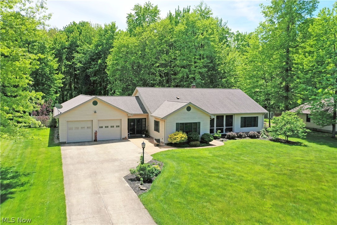 Immensely spacious, and equally impressive, this sprawling Vienna ranch showcases spacious, highly styled living space with a personalized blend of both style and comfort that you have to see to believe! Located in the midst of the desirable Turkey Run community, this artfully crafted home stands alone for casual elegance and surprising features throughout. While its handsome exterior lends well to its curb appeal, additional elements hide in plain sight, such as an enclosed front patio and an extra deep garage with an expansive rear workshop that could potentially convert to a six-car unit. A lavish breezeway links it to the home while around the back; the tremendous, tiered patio space includes a covered gazebo. Step inside to find carefully cultured rooms as the engaging foyer sweeps past a home office to find the open central layout. Sunshine spills from the glass lined far wall as tall ceilings tower over the great room format. A stone lined fireplace offsets formal dining and its built-in display cases. Decadent lighting shines over the polished stone countered island with its bar top seating and hidden storage. The prominent stainless range is a chef’s dream while a pair of windows provide backyard views above the sink. Past the office, the master suite opens to reveal elements such as a dressing and vanity room, a hall-like walk-in closet and an oversized bath with both soaking tub, marbled shower and private commode.  The opposite guest suite brings an elegant nearby bath, brimming with classical design features. Mentionables include walk-in pantry and an incredible laundry room that could quickly convert to a third bedroom.