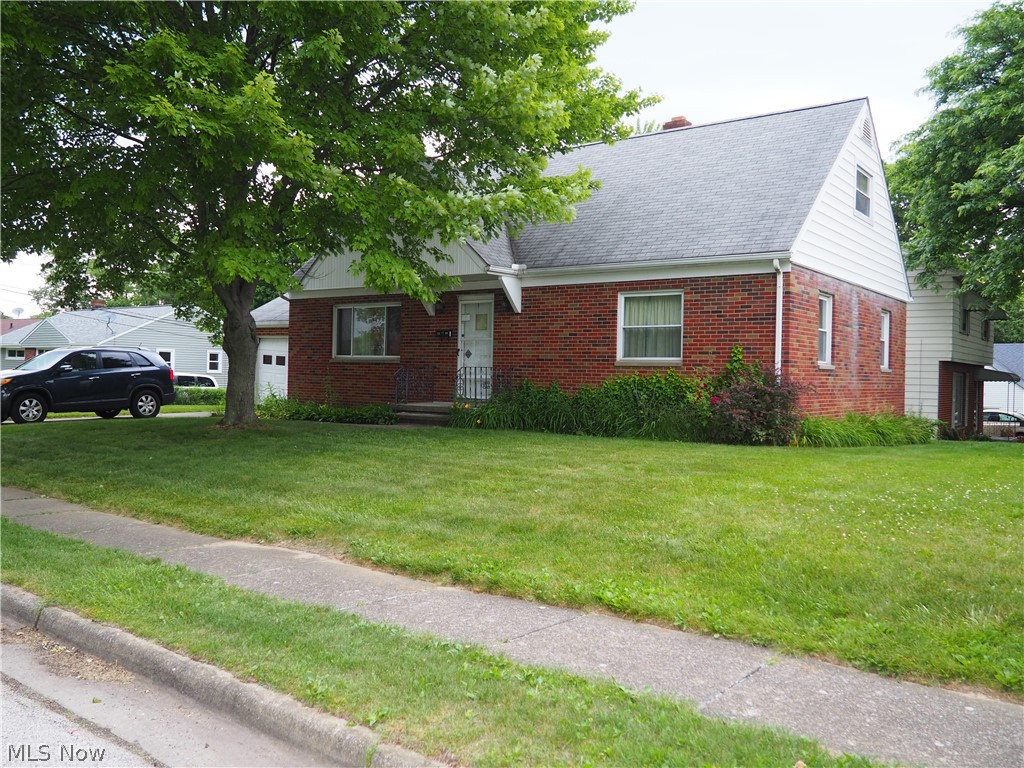 Lot: 130 x 50.  Everlasting brick.  Spacious 3 bedroom 1 1/2 bath home  on large corner lot. Lots of storage. Second floor bedroom with half bath and hard wood floors. Hard wood floors under carpet on first floor..  Replacement windows in most rooms. 
More pictures to follow.