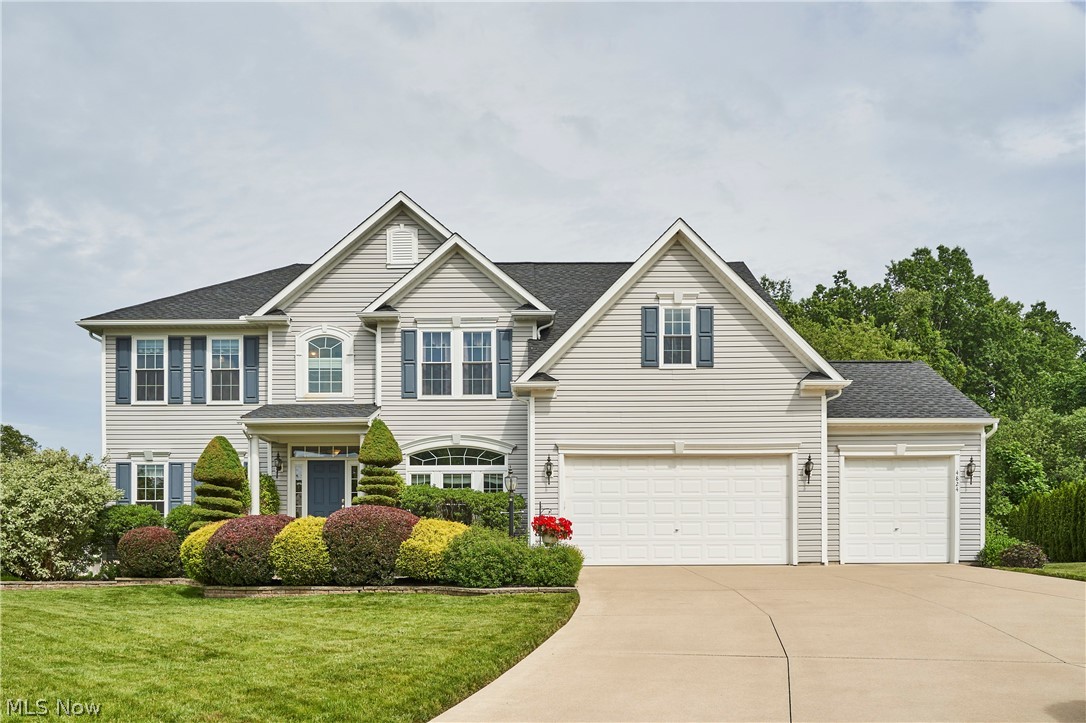 Welcome to this stunning one-owner home in the desirable Westridge Estates of Copley. Boasting over 3800 sq. ft. on the first 2 levels and an additional 2000 sq ft in the lower level.  This residence has a 3 car garage and is perfectly situated on a quiet cul-de-sac. The main floor features a tiled foyer, a private study with glass French doors, and elegant formal living and dining rooms. The gourmet kitchen is a chef’s dream, equipped with cherry cabinets, an oversized granite island, double ovens, double pantry closet  and a massive 20-foot sunroom/eating area  with vaulted ceilings. The cozy family room centers around a stone gas fireplace and offers a convenient second staircase to the upper level. The second floor primary suite is a true retreat with tray ceilings, a sitting area, and the master bath has  a remodeled tiled shower. There are 3-4 additional spacious bedrooms, a versatile hobby room that could be the 5th Bedroom  Bedroom 2 has a private bathroom and a walk in closet. The  finished lower level featuring a custom wet bar and billiards room, media/music room and another full bath.Recent updates include a 2024 roof/gutters, 2023  47 windows, 2025 flooring, and a 2019 Trex deck, , new roof and gutters (2024), and new carpet/LVT flooring (2025). The home is equipped with an irrigation system (2018) and high-end exterior living spaces including a Trex deck  paver patio and hot tub. Dont miss out on this one in Copley Fairlawn Schools!