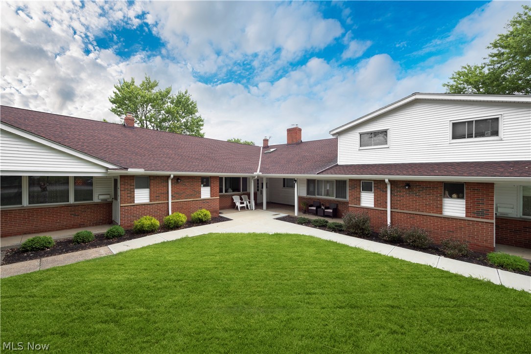 Look no further! This one bedroom/one bath condo exemplifies maintenance free living! Ranch located on the second floor.   Large master bedroom with original hardwood floors, ceiling fan, and double closets.  Freshly painted throughout and all appliances stay!  Spacious living room features a unique exposed brick wall.   Large, private porch off the living room is made of composite wood. GAS/HEAT, WATER, SEWER INCLUDED with HOA fee - all you pay is electric!  Designated parking spot.  This community features a large in-ground pool and club house.  Updates include: New Luxury Vinyl flooring in kitchen and hallway (2019), New Carpet in living room (2019) Roof and siding (2017), Vinyl windows (2018), Refrigerator (2018), Bathroom updated (2017). Amazing desirable location - within walking distance to Great Northern Mall, movie theater, and all surrounding Restaurants. Close to I-480 and Cleveland Hopkins Airport.   Schedule your tour today!