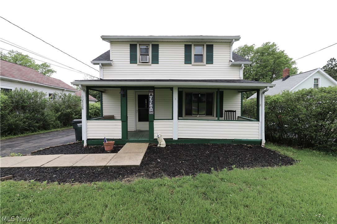 Welcome Home to this adorable Colonial with a full front porch.  Spacious Family Room with Hardwood Flooring.  1st floor full bath with shower & jacuzzi tub.  Eat-in Kitchen offers loads of cabinets & all appliances.  Large Deck is perfect for relaxing that opens to a fully fenced in yard.  Updates include: Refrigerator 2024, washing machine 2024, elec. panel box 2023, hot water tank 2021, roof complete tear off on home & garage Nov. 2025-50 year warranty from the shingle manufacturer & a 15 year transferrable warranty from Hometown Roofing. 1 car detached garage (garage door is on order).  Loads of charm here! A must see!
