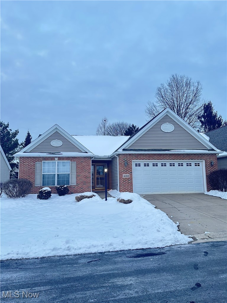 Welcome home to 4165 Ledgewater Dr in Mogadore. This well-cared-for home offers a comfortable, welcoming layout filled with natural light. Inviting living spaces make it easy to relax or entertain, while the peaceful setting provides a perfect place to unwind. Enjoy the outdoor space for morning coffee or gatherings with friends.  A wonderful opportunity to settle in and make it your own.