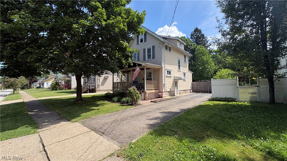 Charming colonial in the heart of Cuyahoga Falls with an inviting front porch. Private fenced in yard with shed and garden areas. Updates include HVAC (2025), built-in microwave (2025), dishwasher (2026), and hotwater tank (2026).  Living Room with custom built-ins, Dining Room,  Bathroom and Kitchen remodeled in the last few years. Note, Dining Room and Bathroom feature new wainscoting. Within walking distance to vibrant downtown Cuyahoga Falls where you can enjoy local shops, restaurants, festivals and entertainment. Convenient to highways, schools, parks and recreation.