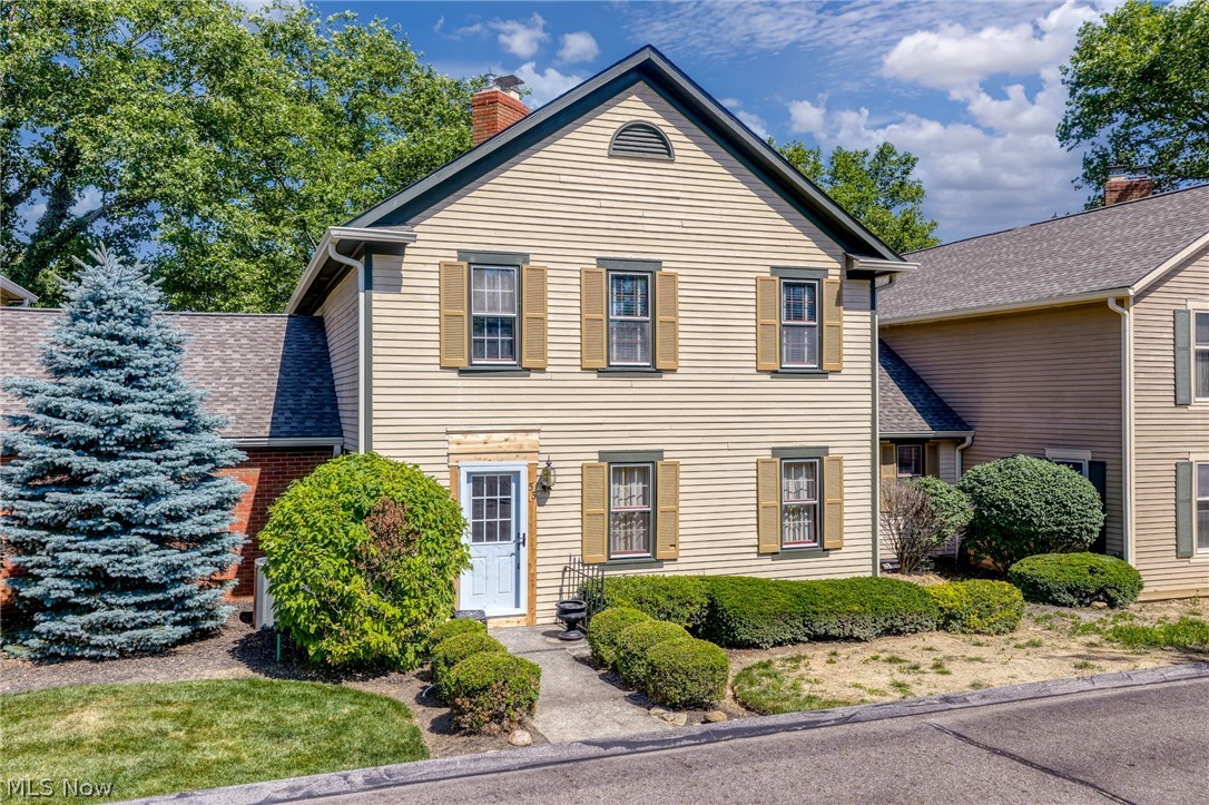 Welcome home to this stunning two-story condo offering unparalleled convenience and sophisticated living, located just steps from historic downtown Hudson. Inside, you will find beautiful crown moldings and gorgeous hardwood floors that flow through an open, light-filled layout.The main level features a welcoming living room with a cozy fireplace. The large, gourmet kitchen comes complete with a spacious walk-in pantry and ample workspace for the home chef waiting for your perfect touch. Formal dining room and sitting room offer flexibility and space to entertain. Designed for easy living, the main floor includes a convenient primary bedroom and a first floor laundry room. Upstairs, you will find two additional expansive bedrooms, each serving as a private retreat with its own dedicated en-suite bathroom and generous closet space. The living space doubles with finished full lower level, a true extension of the home, featuring a large family room for movie nights, a dedicated home office, a private gym setup, and a practical workshop. It also hosts a secondary laundry hookup, offering maximum convenience. Enjoy the vibrant Hudson lifestyle with effortless, walking-distance access to premier shopping, fine dining, community events, and top-rated schools, all while enjoying the low-maintenance perks of condo living. Don't miss this rare opportunity to make it your home in one of Hudson's most desirable locations. Schedule your private tour today!