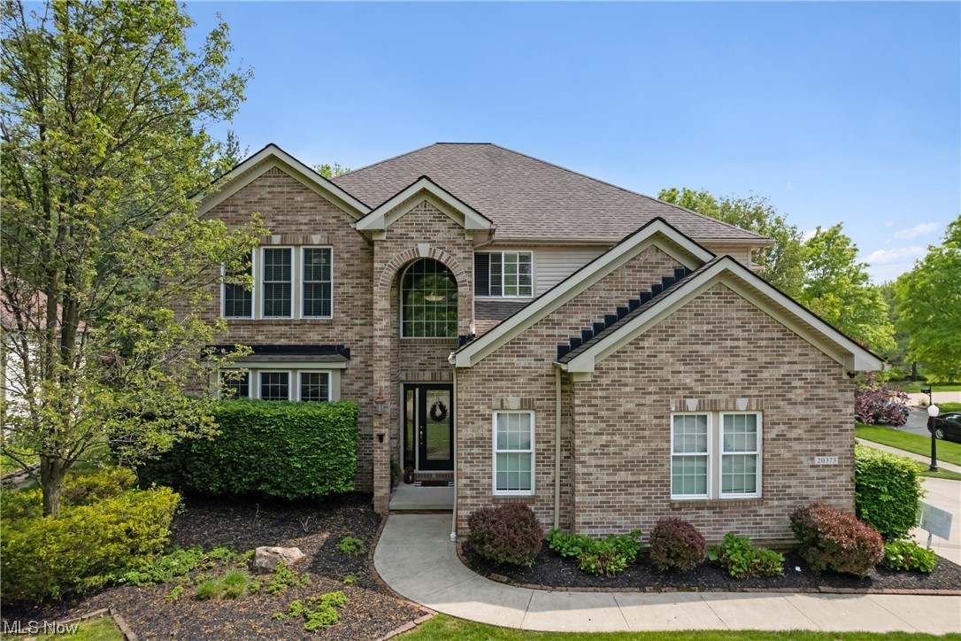 Welcome to this exquisite brick colonial located in the desirable community of Strongsville, Ohio. This stunning property boasts five bedrooms, four full bathrooms, high ceilings in the great room, three-car attached garage, fenced-in yard, and convenient first-floor amenities, making this home the epitome of elegant suburban living. One of the highlights of this home is the first-floor bedroom and full bathroom. This versatile space offers flexibility and accessibility, making it ideal for guests,  or a home office. The primary suite is a true retreat, boasting a luxurious en-suite bathroom complete with a soaking tub, a separate shower, and dual vanities. Whether you envision a recreation area, a home gym, or a cozy entertainment room, the finished basement space can be tailored to suit your preferences. Outside, the property features a beautifully landscaped and fully fenced-in yard. The irrigation system ensures a lush and vibrant outdoor space throughout the seasons. Notable updat