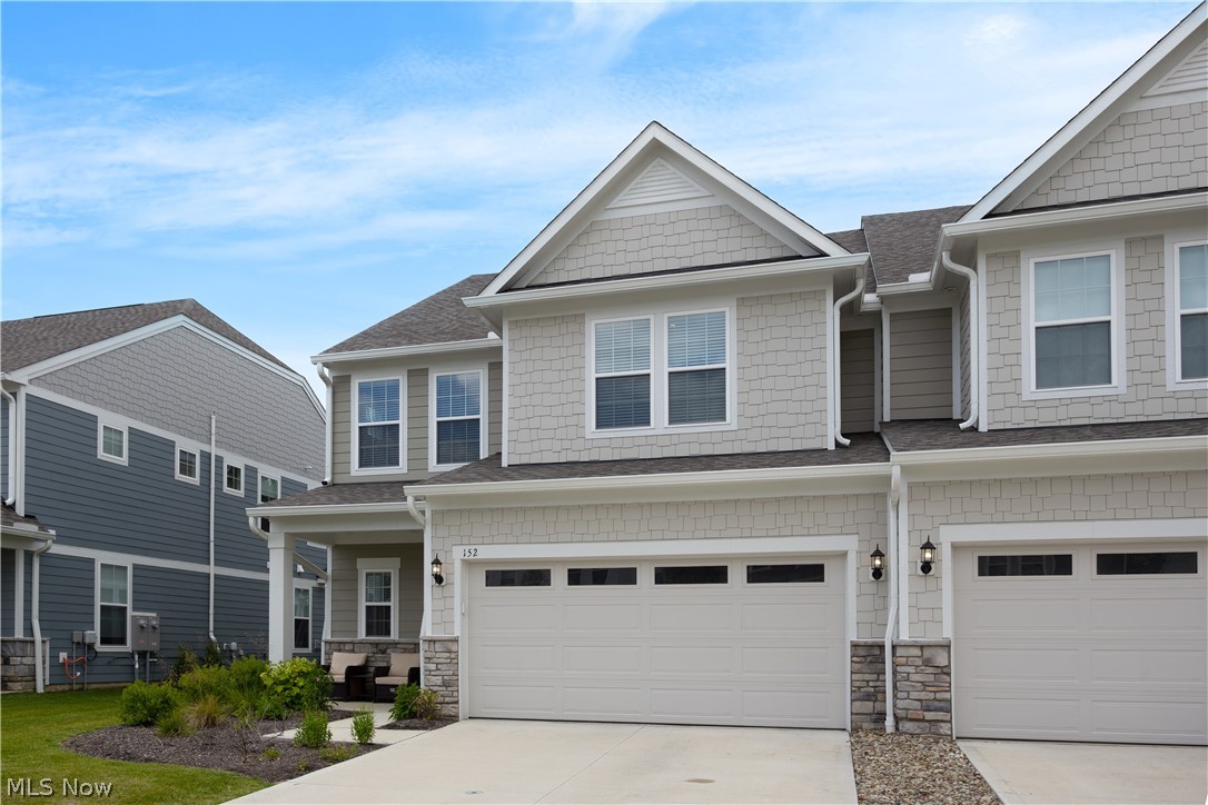 Welcome to Lake Balaton Drive, where luxury, convenience, and maintenance-free living come together in one of Orange's most desirable new communities. Built in 2024 and better than new, this stunning three-bedroom, 2.5-bath townhome offers the perfect blend of sophisticated design, thoughtful upgrades, and an exceptional location. Step inside to discover a bright, open-concept floor plan highlighted by soaring ceilings, abundant natural light, and designer finishes throughout. The heart of the home is the beautifully appointed kitchen featuring crisp white cabinetry, quartz countertops, stainless steel appliances, a spacious center island with seating, and seamless flow into the dining and great room. A cozy fireplace anchors the living area, while the adjoining sunroom offers the perfect spot to enjoy your morning coffee. The highly sought-after first-floor owner's suite provides a private retreat complete with oversized windows, a walk-in closet, and a spa-inspired bath featuring a double vanity and glass-enclosed shower. A dedicated home office, convenient first-floor laundry and mudroom, and attached two-car garage add to the home's effortless functionality. Upstairs, you'll find a spacious loft ideal for a second living area, media room, or play space, along with two generously sized bedrooms featuring walk-in closets and a beautifully finished full bath. Skip the wait for new construction and move right into this exceptional home that offers the luxury of new, the convenience of a completed community, and the lifestyle you've been searching for.