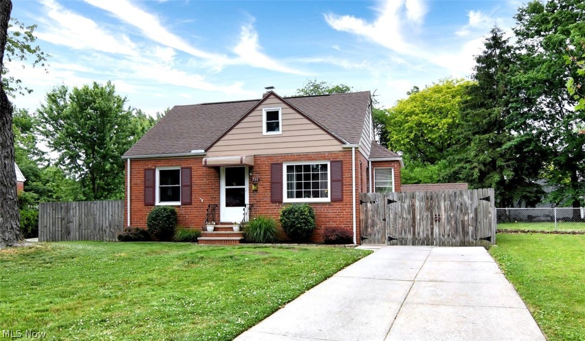 Welcome home to this well-maintained 3-bedroom, 2 full bathroom brick Cape Cod in Euclid! Step inside to find beautiful hardwood floors flowing through the inviting living room and two first-floor bedrooms. The main level also features a full bathroom, an eat-in kitchen, and a convenient side porch/mudroom, offering practical everyday functionality. New energy-efficient vinyl windows installed (June 2026) help enhance comfort and efficiency throughout the home.
Upstairs, you'll discover the third bedroom complete with pine floors, built-in drawers, two cedar closets, and a large storage closet, providing an abundance of storage space. The partially finished basement expands your living options with room for a family room, home gym, playroom, or recreation area. A second full bathroom with a tiled walk-in shower is located near the laundry area for added convenience.
Outside, enjoy a large fully fenced backyard featuring a patio, fire pit, and detached garage—perfect for entertaining, relaxing, or giving pets and kids plenty of room to play.
Conveniently located with easy access to I-90/Route 2 and I-271, this home makes commuting and getting around town a breeze. Enjoy all that Euclid has to offer, including the brand-new Recreation & Wellness Center opening this month, nearby Briardale Greens Golf Course for a round of golf, and beautiful Sims Park, featuring Lake Erie beaches, a fishing pier, disc golf course, and scenic lakefront walking trails. This move-in-ready home offers comfort, functionality, and a fantastic location close to some of Euclid's best amenities.
