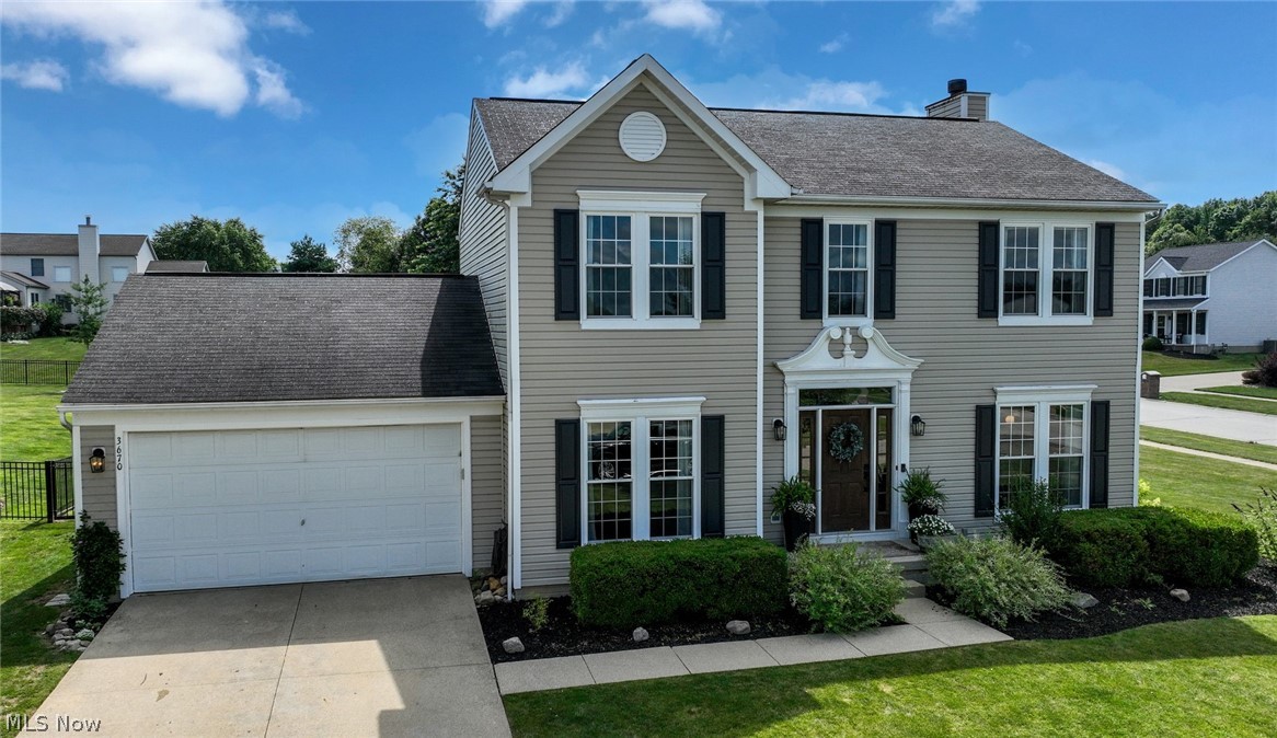 Welcome home to this beautifully updated 4-bedroom 2.5 bath property in the desirable Harvest Hills development in Rootstown, where every detail has been thoughtfully enhanced for today's lifestyle. From the moment you arrive, you'll appreciate the professionally landscaped yard, stamped concrete patio, raised cedar garden beds, and fully fenced backyard with elegant black metal fencing—perfect for relaxing or entertaining. Inside, you'll find a fresh, modern interior featuring Provenza luxury vinyl plank flooring throughout, fresh paint, updated lighting, and stylish railings and banisters. The heart of the home is the renovated kitchen with refinished cabinetry, quartz countertops, a tile backsplash, and a new sink and faucet. The inviting living room offers custom built-ins surrounding a Revillusion electric fireplace, creating a warm and sophisticated gathering space. French doors provide privacy for the first-floor office or flex room. The finished lower level expands your living space by close to 500 square feet with new drywall, carpeting, and a modern black ceiling—ideal for a recreation room, home theater, gym, or playroom. With extensive updates completed since 2021, this truly move-in-ready home offers the perfect combination of style, function, and outdoor living.  Make your appointment today, you sure won't be disappointed!
