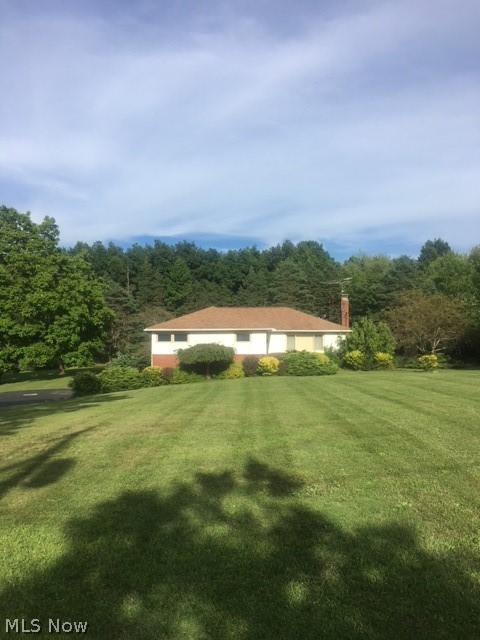 Welcome to Rosetta Drive! 3 bedroom, 2.5 bath ranch is on 1.5 acres in Munson Township with West Geauga schools. First floor has 3 bedrooms, 2 full baths, includes full bath off of master bedroom. Living room with fireplace. Walk out lower level includes rec room, half bath, and laundry room. Additional 25 areas of community property access. Show and sell!
