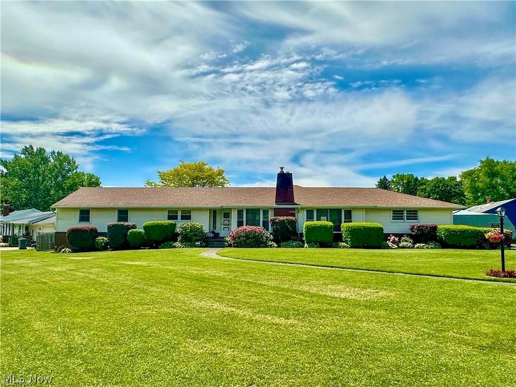 If you're looking for a fabulously sprawling and spacious three bedroom brick ranch, then this is it! Sunlight shines through the living room and dining room areas, along with the family room and eat-in kitchen. These spaces provide plenty of living and entertaining options. The generously-sized primary bedroom showcases a cathedral ceiling, attached bath, walk-in closet and, best of all, a slider to the deck, hot tub,  above-ground pool and newly added gazebo. Each of the two additional bedrooms are complemented with walk-in closets. The classic knotty pine lower level rec room with fireplace is just one more reason to love this home.