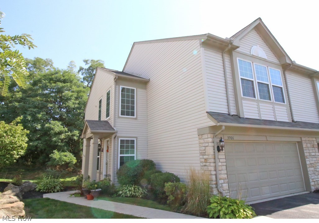 Beautiful Montrose Park Townhouse. A highly sought after end unit townhouse offers additional green space on the front entrance side.  Upon entering the front door you will see the open floor plan with lots of natural light bringing the outdoors inside. The living room features a gas burning fireplace, perfect for cozy nights while enjoying a night watching TV. The kitchen opens to the dining room that has sliding doors leading to a secluded patio area that backs up to a wooded lot offering lots of privacy when relaxing. The oversized owner's suite boasts a private full bath and a large walk-in closet. Conveniently located on the second floor is the laundry room next to bedrooms.  There is a 2nd floor loft area perfect for a home office. Newer carpet on main floor in fall of 2020. 2 car attached garage. If you are looking for a low maintenance lifestyle home, schedule your private showing today!