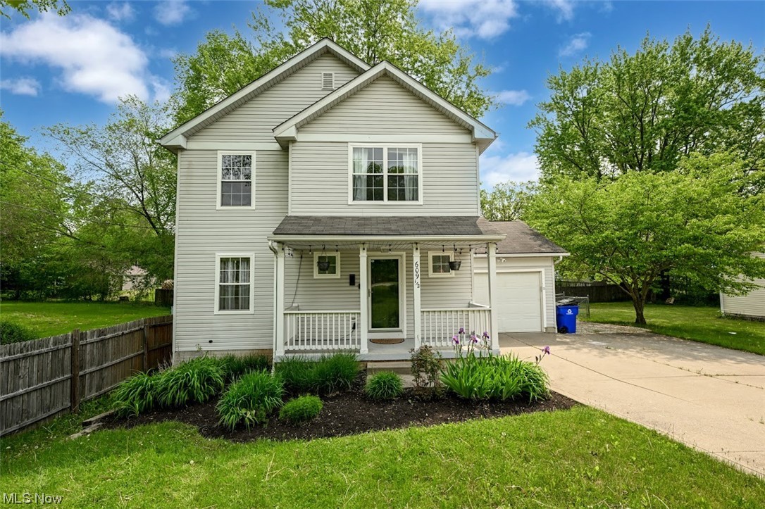 Welcome home to this darling, newer 4 bedroom, 1.5 bathroom home! This home is completely move-in ready and is just waiting for its new owners! Enjoy a large kitchen with a custom built butcher block island and all newer appliances! The first floor offers an updated decor, newer low-maintenance laminate flooring and an open concept living room, dining room, kitchen and half bath...complete with sliders to a spaciousl custom deck! Upstairs you will find 4 bedrooms and a full bath. Full basement has a solid pour foundation and could be perfect for crafting or an exercise space or has the potential to be finished for a recreation room too! Outside you will find a fantastic fully fenced-in back yard, playground area, and under deck storage! This is a must see! Hurry, before it is gone!