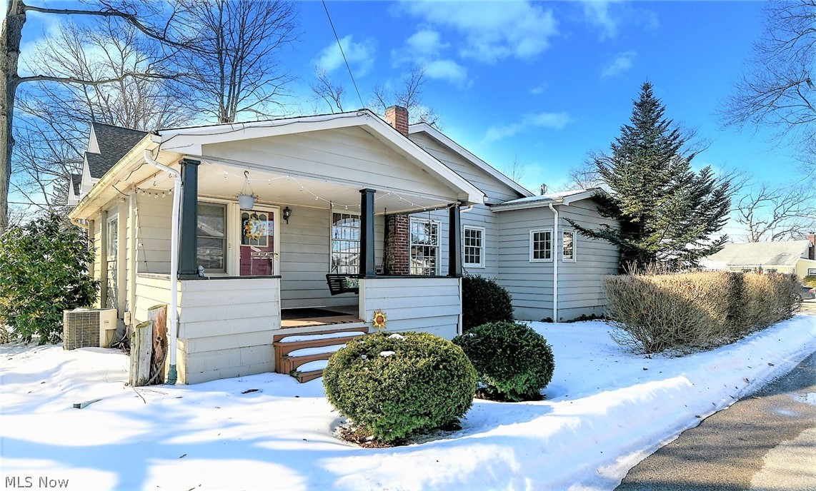 *Beautiful 1950+ Sq. Ft. RANCH W/Vaulted Ceilings Near Portage Lakes! *No Outlet Street *Turkeyfoot Golf Course AND Main Chain Of Portage Lakes ALL Right Here! Watch Boats, Annual Fireworks, Golf, Dine And More ALL Within Walking Distance! *Turkeyfoot Lake Sits On One Side Of The Home And Mud Lake, The Other *2-3 Bedrms, 2 FULL Bathrms *Partial Finished Basement - Great Opportunity *Natural Hardwood Floors Throughout & Under The Carpet *Cute Covered Front Porch To Sit Outside & Relax On The Swing Enjoying A Morning Breeze W/Slight Water View *OVERSIZED Living Rm Provides So Much Space For Couch And Extra Sitting Area *The Master Bedrm Has 2 Closets & Adjacent Full Bathrm *STUNNING Office (OR Use As A Large 3rd Bedrm, Would Need A Barn Door Or French Doors To Close It Off- Wide Opening) W/Knotty Pine 14 Ft. VAULTED CEILING! *Jack N Jill Full Bathrm W/Walk In Shower *FULLY APPLIANCED Kitchen W/NEWER 3D Shaker Style Cabinets & Pantry W/Pullout Drawers *Dramatic Sunken Dining Rm W/A Beauti