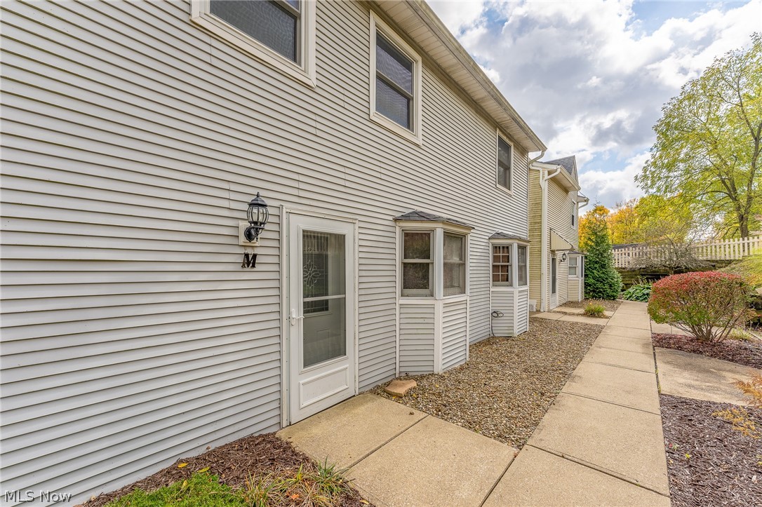 What an amazing opportunity to own a 2 bedroom condo on the outskirts of Mantua! This well-kept unit boasts comfort and charm throughout.  Gorgeous entry into large foyer with wood floors.  Living room with fireplace greets guests, with 1/2 bath and laundry off main hallway.  Formal dining room and large oversized kitchen complete first floor.  Kitchen has plenty of cabinet space and countertops, with eat in bar area.  Additional living room off kitchen and formal dining room is perfect for family gatherings and holidays.  Head upstairs for 2 large bedrooms, including master bedroom with its own fireplace - perfect for those cold winter nights.  This is one of the largest units, private parking and very close to downtown Mantua.  Schedule your showing today before this one is SOLD.