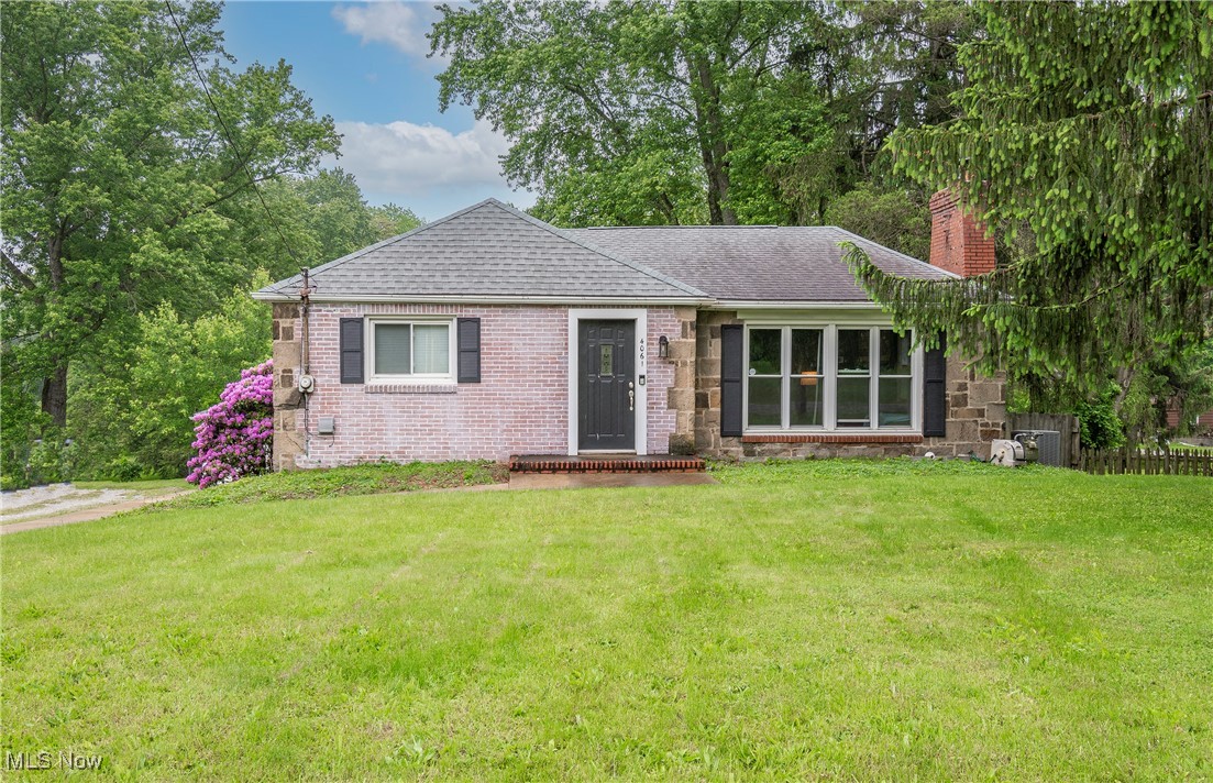 Welcome to this beautifully updated 3-bedroom, 2-bathroom ranch nestled just minutes from the scenic Portage Lakes! Step inside to a spacious and sun-filled living room with a fireplace, perfect for relaxing or entertaining guests. The main level features three generously sized bedrooms and a large full bathroom, offering comfortable living for families or guests. The lower level is equally impressive, boasting a modern, updated kitchen with stainless steel appliances (most 2018), a roomy dining area, and a cozy family room—ideal for movie nights. Both the kitchen and dining room offer direct access to a large patio, making indoor-outdoor entertaining a breeze. You’ll also find a second full bathroom and a convenient laundry room downstairs—washer and dryer stay! Outside, enjoy a stunning, fenced-in backyard complete with a spacious patio and dedicated gardening area—great for outdoor dining, summer BBQs, or simply soaking up the sun. A detached 2-car garage adds convenience and additional storage. Don’t miss your chance to own this well-maintained gem with modern updates and unbeatable location near the lakes. Schedule your showing today!