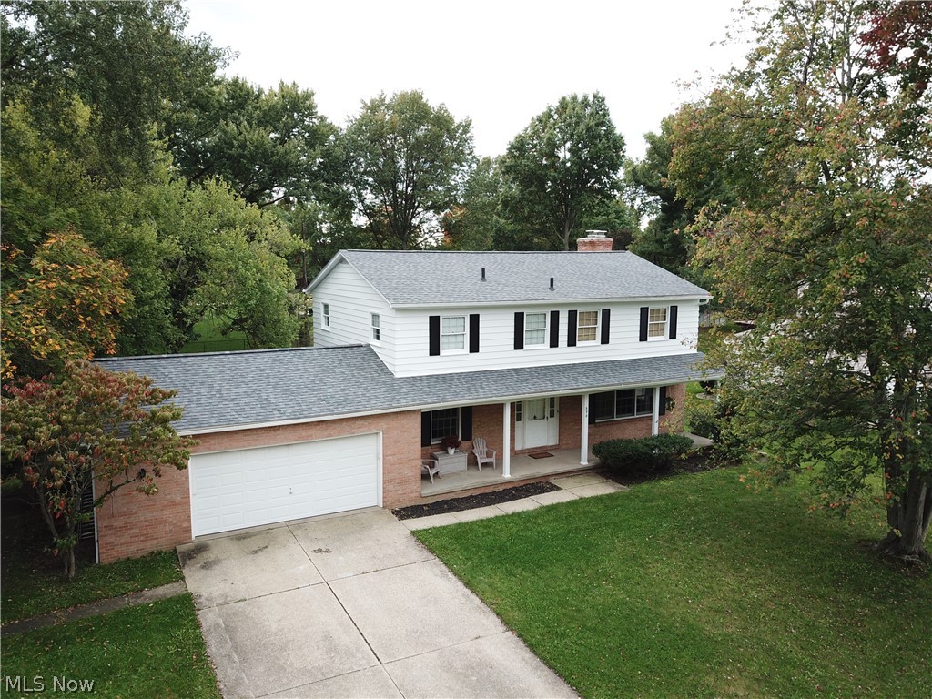 This lovely 4 bedroom Colonial is sure to WOW you! New roof (7/2018), newly painted exterior (7/2018), interior updates. This spacious Woodridge school district home features a formal living room and dining room, eat-in kitchen with tile backsplash, comfortable family room with a newer carpet and gas fireplace and an inviting 3 season sun room with Naturestone flooring. On the 2nd level, you'll find ample storage space in the bedrooms: the Master bedroom features a private bath and 3 closets! The lower level Rec Room offers additional space for relaxing and enjoying a game of pool. Pool table conveys! First floor laundry, attached 2 car garage. Home warranty. Fresh, clean, and ready for you to make it HOME!