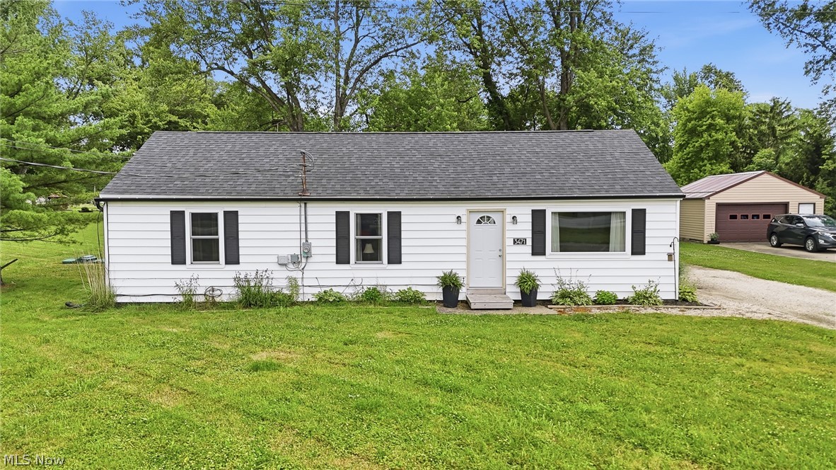 Welcome home to this beautifully maintained 4-bedroom ranch situated on over an acre of land, offering the perfect blend of space, comfort, and convenience. This move-in ready home features a spacious kitchen with newer appliances, cabinetry, and countertops, along with a dedicated dining area ideal for everyday living and entertaining. The generous laundry/utility room adds functionality, while the large, detached garage provides ample storage, workspace, and parking! The attic additionally offers abundant storage space as well! Outside, enjoy the spacious yard with plenty of room for outdoor activities, gardening, gatherings, or simply relaxing in your own private setting. Major updates provide added peace of mind, including a new roof, A/C, septic system, and windows in 2021, plus a new hot water tank and fully wired electric detached garage. With so many improvements already completed, all that's left to do is move in and make it your own. Schedule your private showing today before this one is SOLD!