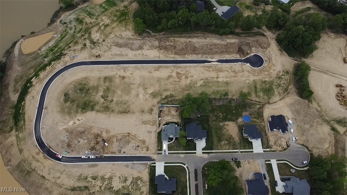 ***Model Home is located at 542 E Lakewood Dr, Canal Fulton, OH. 44614 and open weekly Saturday 12-2, Sunday 12-2 or by appointment***. Build your dream home with Modern Home Concepts on one of 33 premium residential homesites in phase 2 of Lakewood Estates, one of Canal Fulton’s newest and most desirable communities. Located just minutes from the historic downtown, parks, trails, restaurants and shops, this neighborhood offers the perfect blend of small-town charm, modern convenience, and long-term value. Lakewood Estate is located in the Northwest Local School District, with lot sizes ranging from approximately 0.37 to 1.66 acres at a great value, ideal for a variety of custom home designs. Select lots offer waterfront pond views, while many provide walk-out basement potential, enhancing both everyday living and appeal. All homesites are build-ready with city utilities including public water and public sewer. Buyers can build with Modern Home Concepts, a custom home builder that is Energy Star Certified®, offering energy-efficient construction, higher end quality, lower utility costs, and homes designed for comfort, performance, and long-term resale value. An exceptional opportunity to create a luxury, energy-efficient home in a growing community. Reference MLS number 5183216 for more details about a home example that you can build on this lot or bring your own ideas!Call today for additional details and current lot availability.