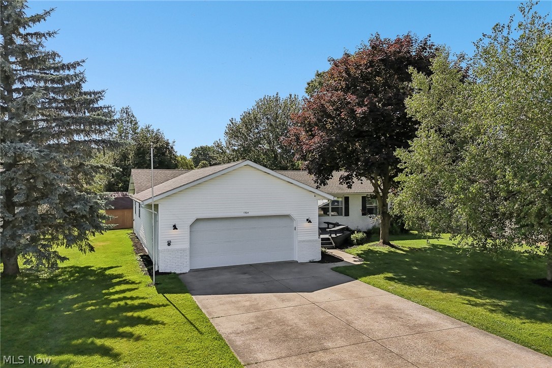 Completely renovated & move-in ready, this stunning ranch offers the perfect blend of modern style & functional living! Walls were removed to create an inviting open-concept floor plan filled w/natural light & thoughtful design. A charming front porch w/built-in seating welcomes you inside, where the entry showcases architectural character w/a custom built-in console & accent lighting. The vaulted living room features recessed lighting & sliding doors leading to the back deck. Designed for entertaining, the dining area offers a built-in beverage bar. The showstopping kitchen boasts an 8-9 ft center island, Quartz counters, extensive cabinetry w/underhead lighting, tile backsplash, pantry, & glass Samsung Bespoke appliances. A convenient FF laundry room w/cabinetry located nearby. Retreat to the serene primary suite, featuring 2 closets w/California Closet systems & a beautifully renovated ensuite bath. Two add'l bedrooms w/recessed lighting & custom closet systems, & a 2nd fully renovated full bath complete main level. The LL adds flexibility w/a bonus room perfect for an office or 4th bedroom, & full bath. A huge unfinished area provides abundant storage & direct access to the attached 2-car garage. Situated on a .28-acre lot w/a deck & storage shed, this property boasts easy access to shopping, dining, & highways. This fully renovated, bohemian-inspired home is truly turnkey – all you have to do is move in & unpack your bags! A full home inspection has already been completed & is available upon request. The anticipated selling range is $355,000 to $400,000. Offers are due by 6:00 pm on June 30. However, buyers should not wait to submit their offer. The seller reserves the right to accept an offer before the deadline. If the sellers reserve price is not met by the deadline, they will call for highest & best offers. Buyers who do not want to risk missing this rare opportunity may secure the property immediately with the $400,000 buy-it-now option & no contingencies.