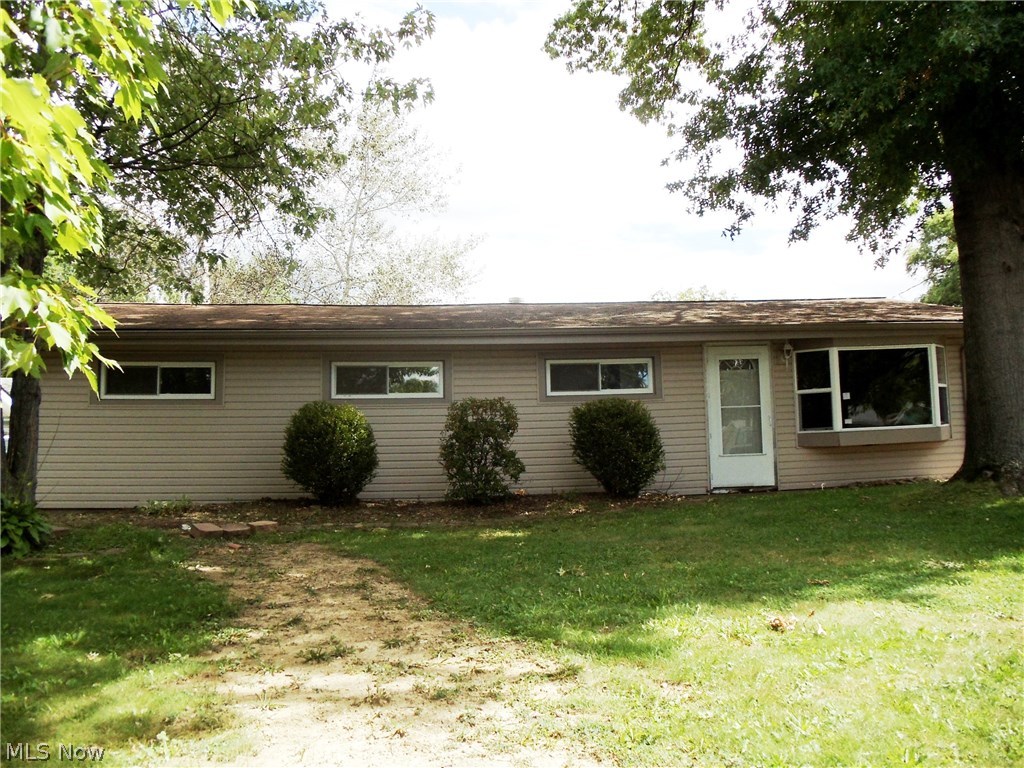 Nice 3 bedroom, 2 full bath ranch waiting to be yours!  Large fenced yard with deck and covered patio - great for entertaining. House has vinyl siding and newer vinyl replacement windows throughout. Remodeled kitchen, formal dining room, large living room with tons of natural light and vaulted ceiling, spacious bedrooms, 2 full baths. Oversized garage with large workshop/storage area. Great location. Close to tons of amenities and interstate access.  Sold as is. Buyer to assume any/all city POS violations, if applicable.